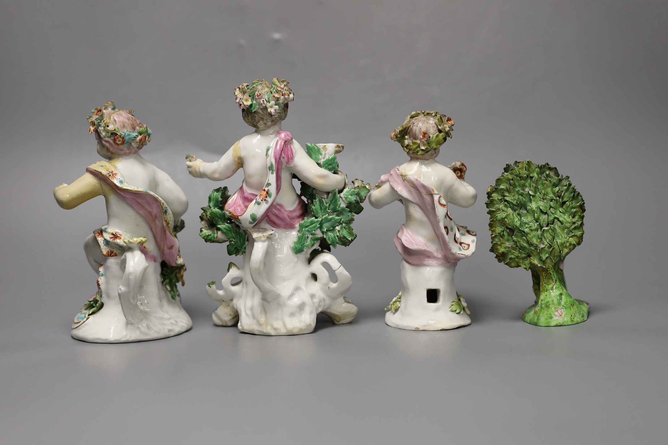 Three 18th century Derby porcelain putti (a.f) and another later continental putti, tallest 17cm